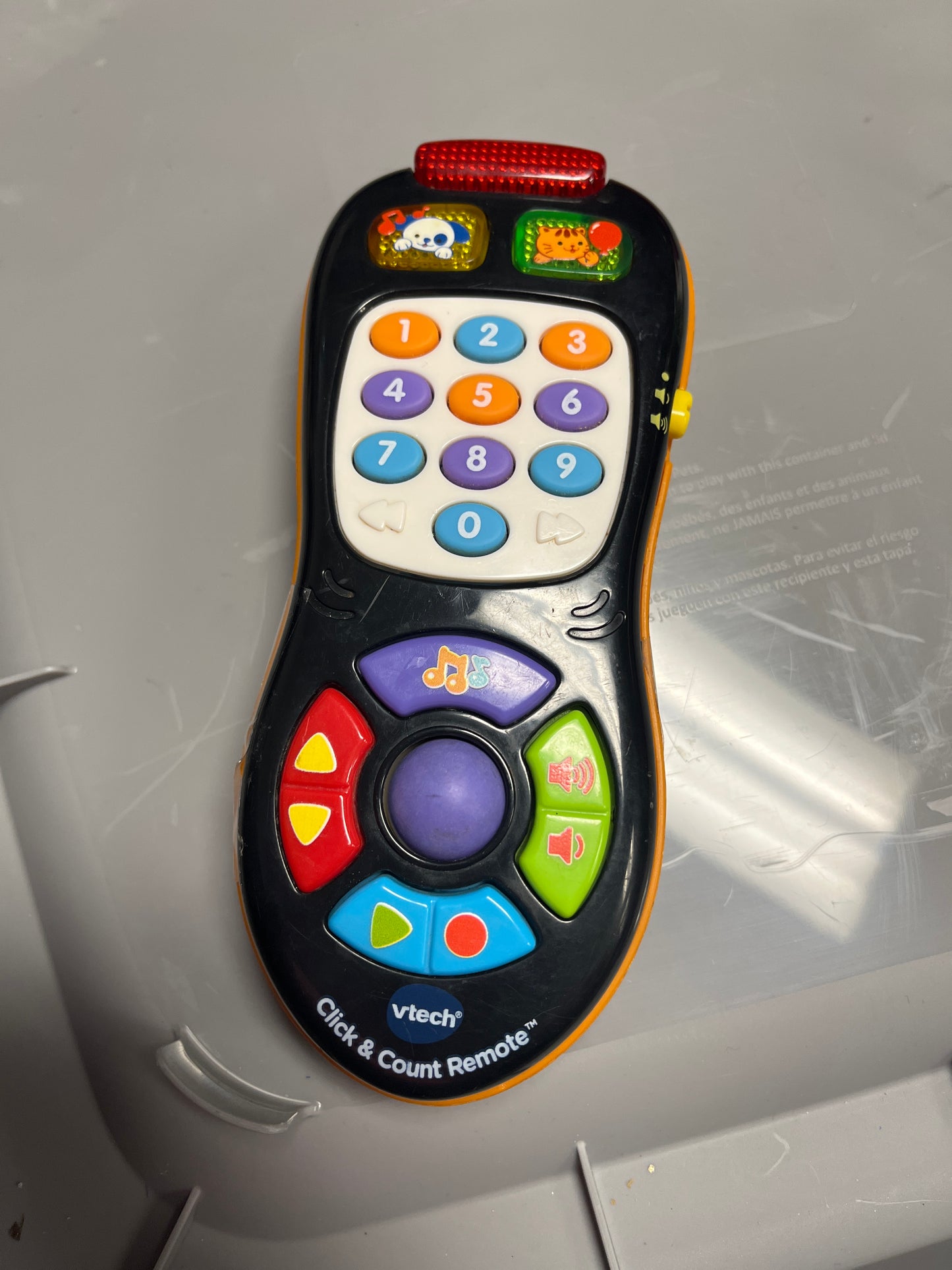 orange/black Vtech Click & Count Remote