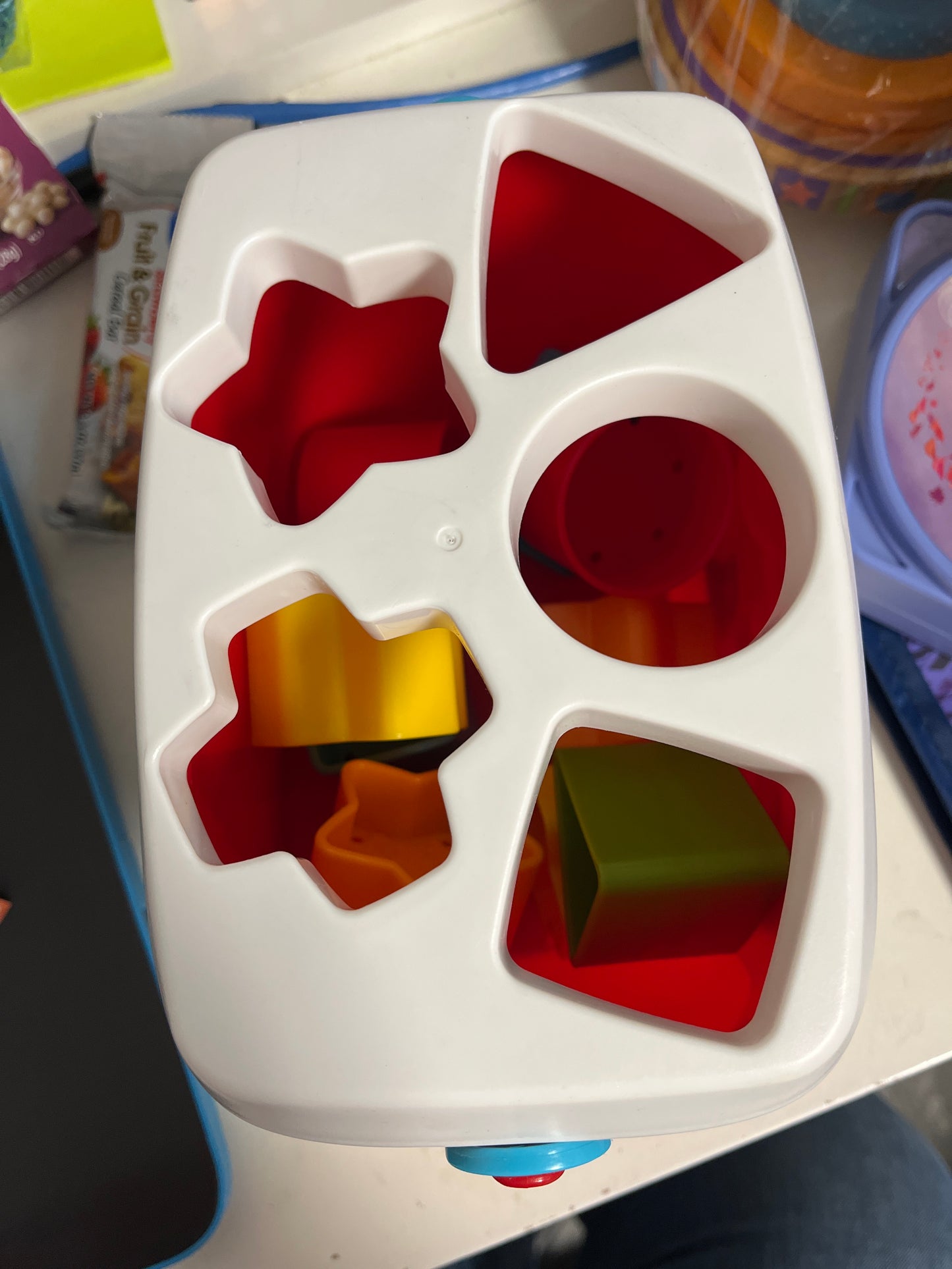 red/white Fisher Price Sorting Blocks