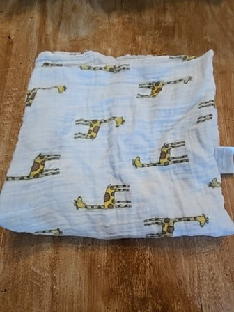 White Aden + Anais Giraffe blanket