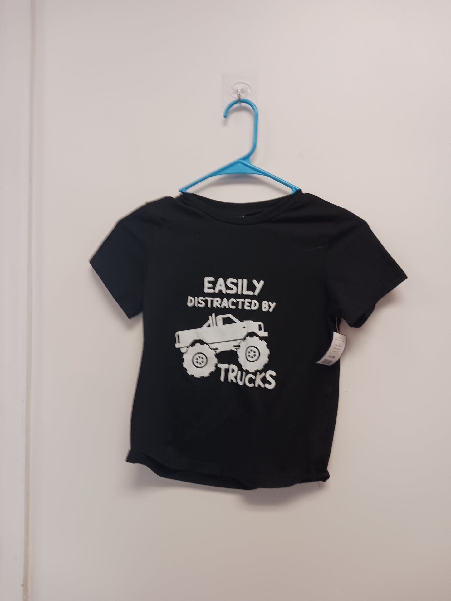 Black Shein Easy Distracted by Trucks shirt, 7 B