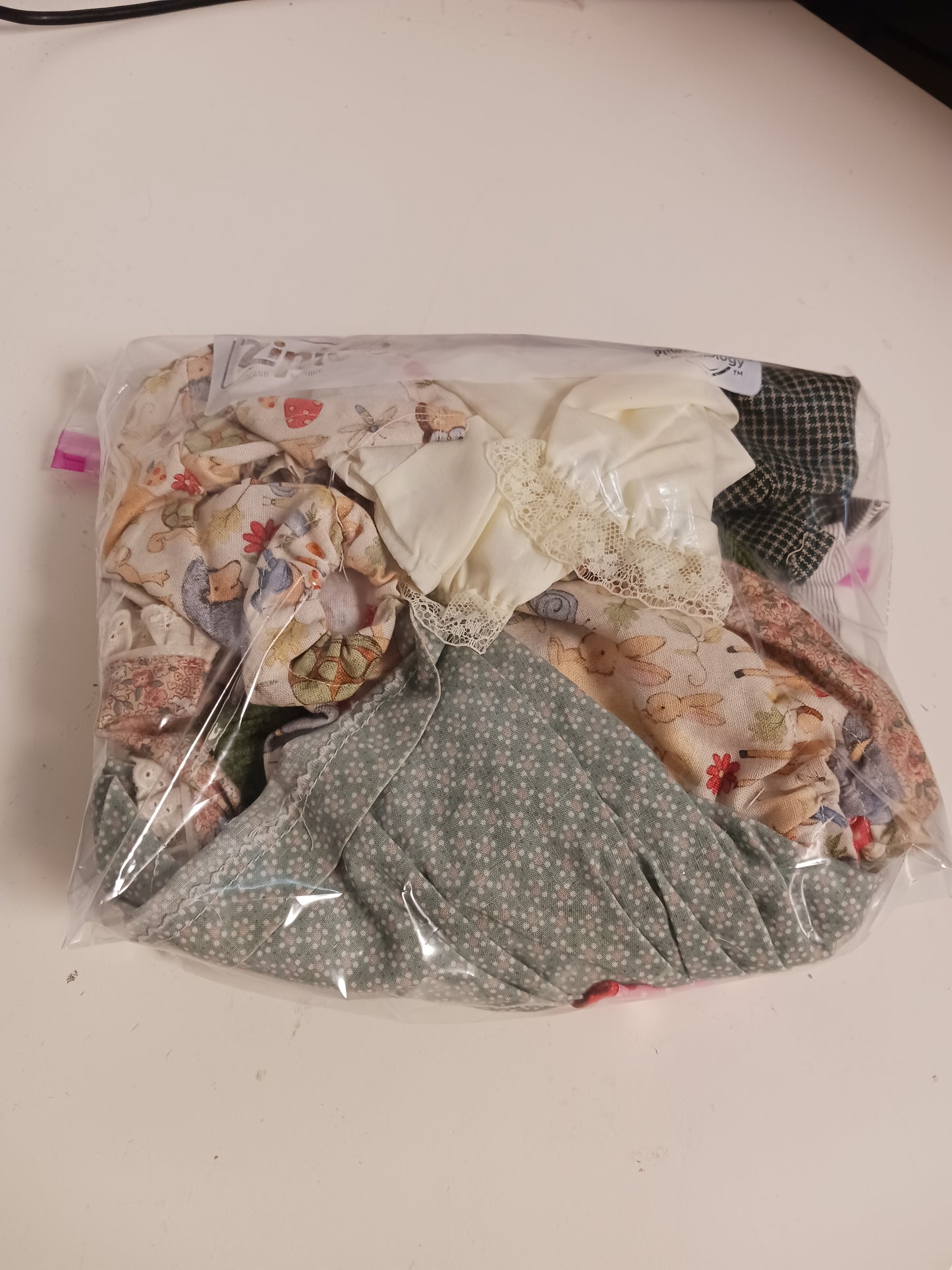 Bag of Doll Clothes