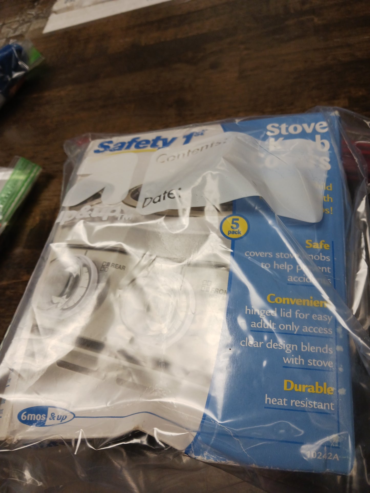 white Safety 1st Stove Knob Covers