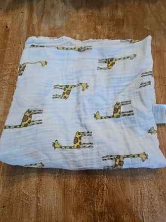 White Aden + Anais Giraffe blanket