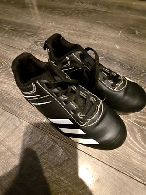 Black/white Adidas Soccer cleats, 10