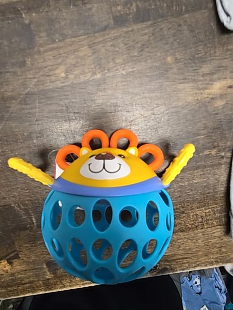 Yellow/Orange/Blue Nuby Lion Rattle Ball