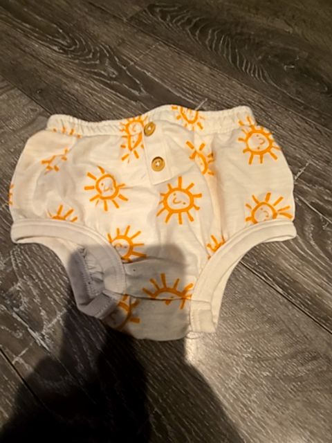 Cream with suns Cat & Jack Shorts, 6M B