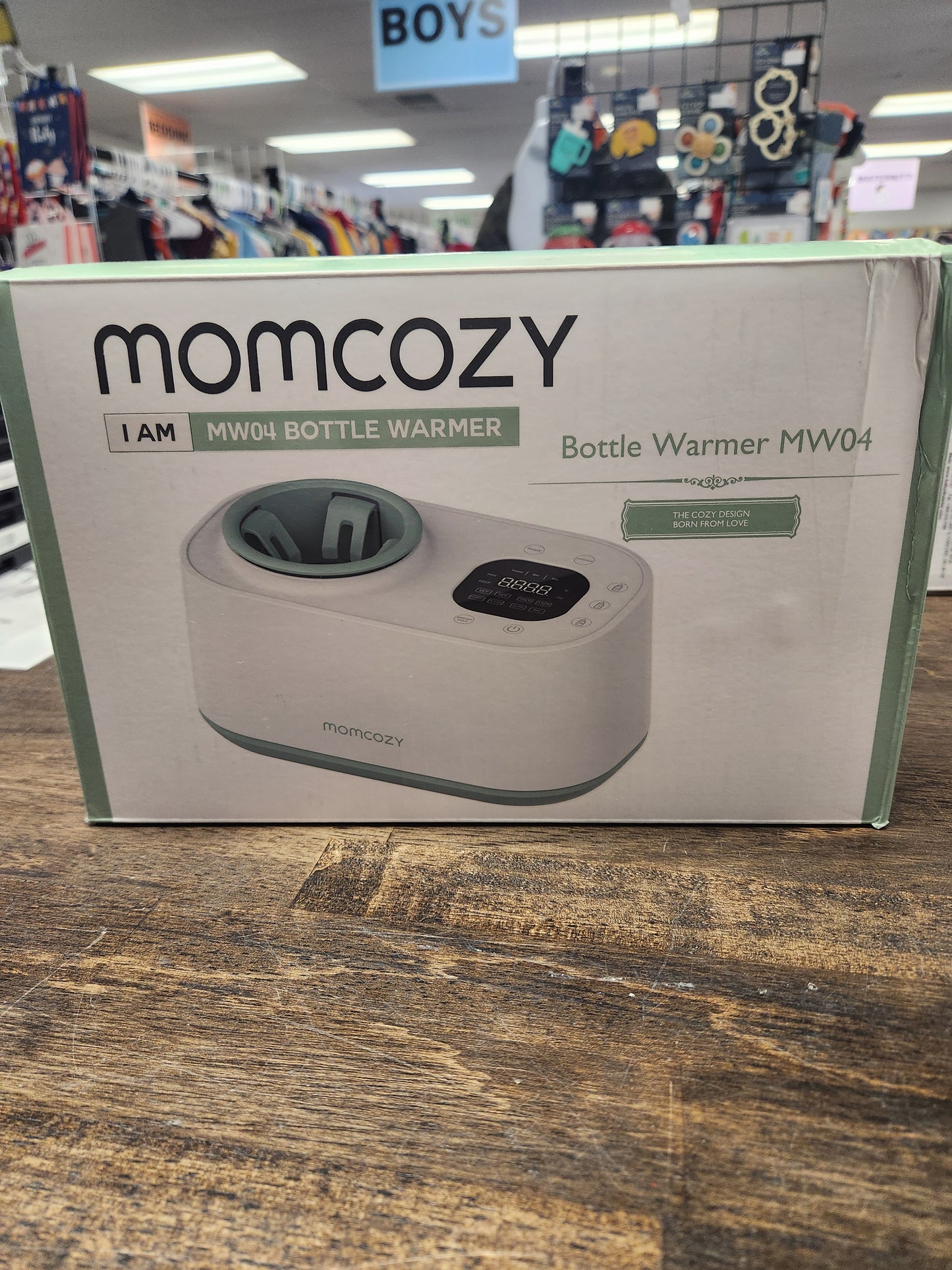 White/Green Momcozy Bottle Warmer