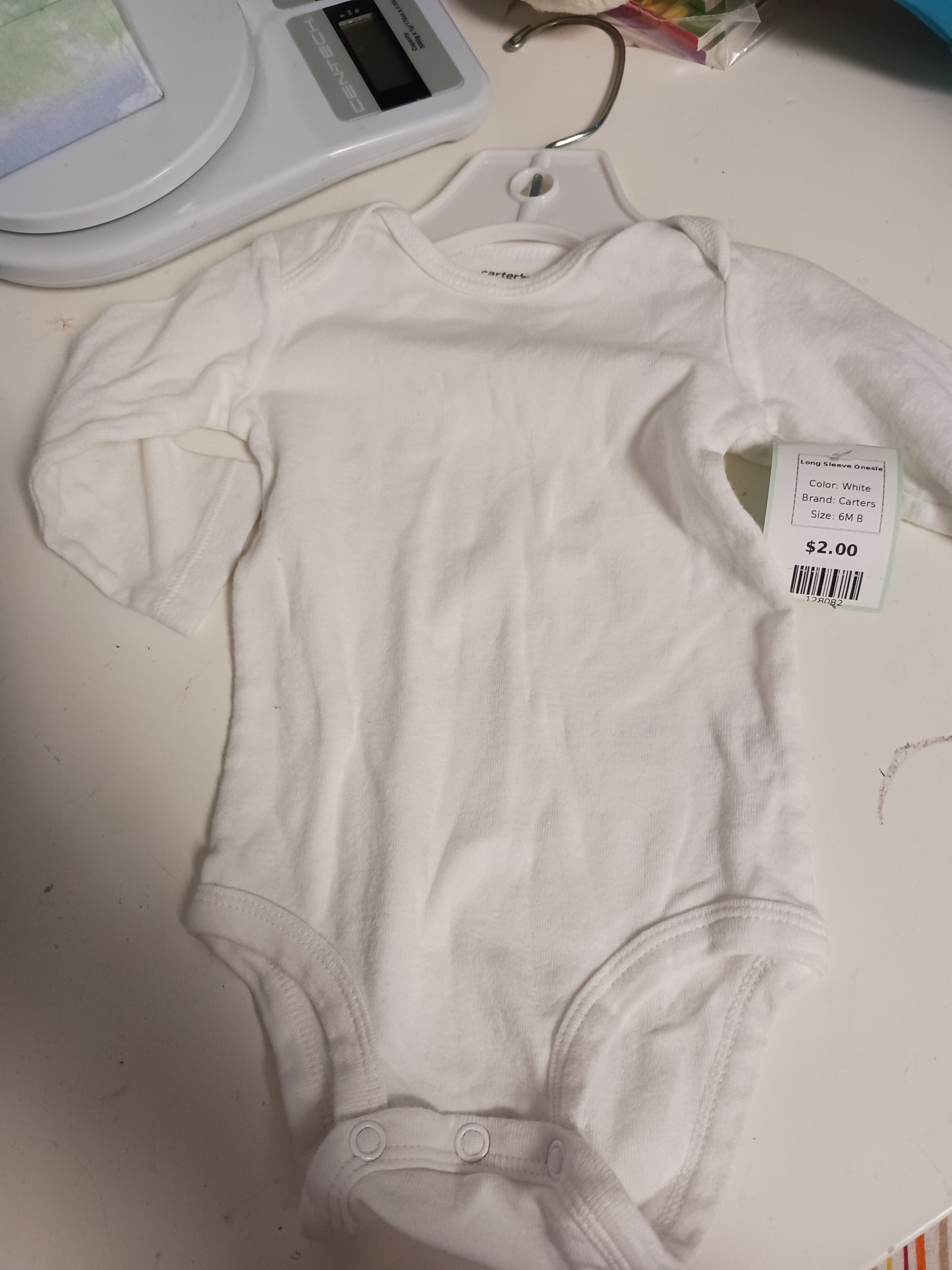 White Carters Long Sleeve Onesie, 6M B