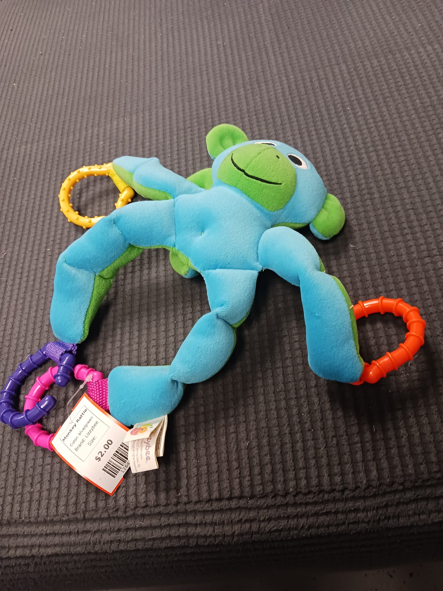 blue/green Lizzybee Monkey Rattle