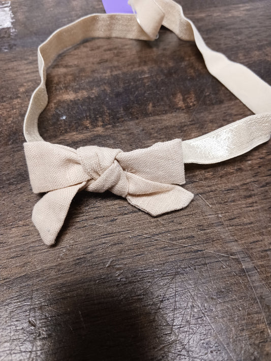Tan  Bow