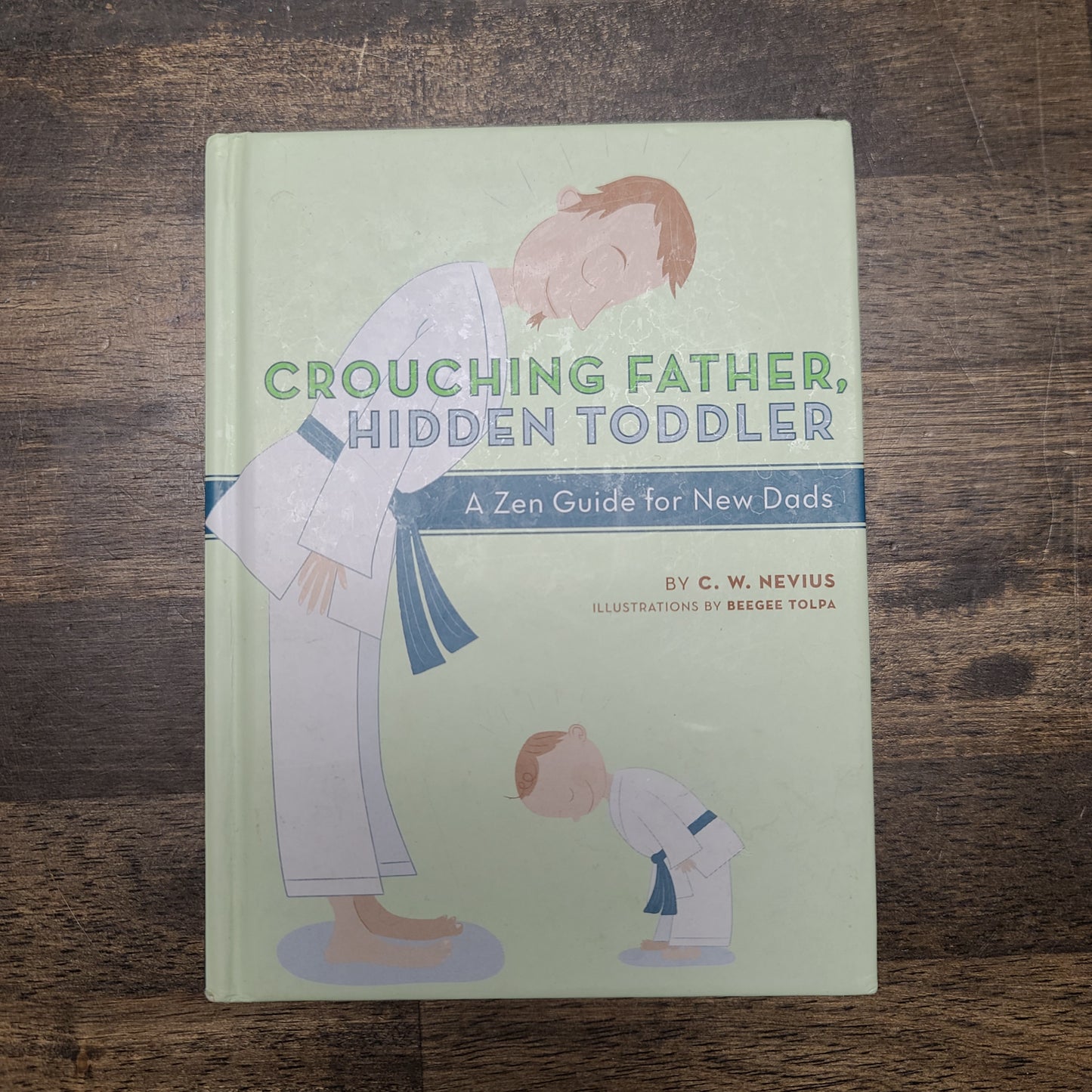 Crouching Father Hidden Toddler