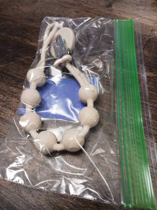 Cream Cuddle Campus Pacifier Clip