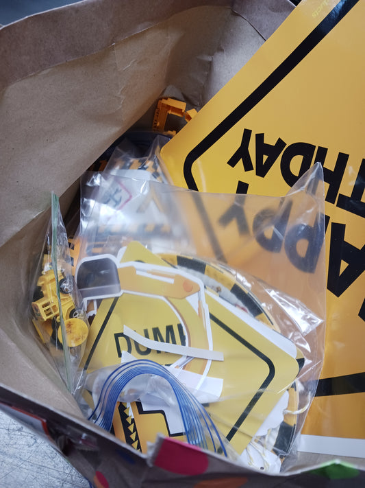 Yellow Construction Bag Of Party Supplies
