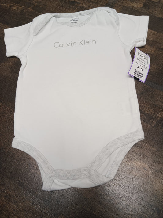 white Calvin Klein onesie 6-9m, 6M B
